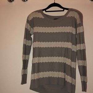 Chic light weight grey sweater with lace design.